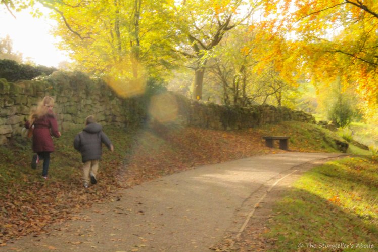 sunlit path with children