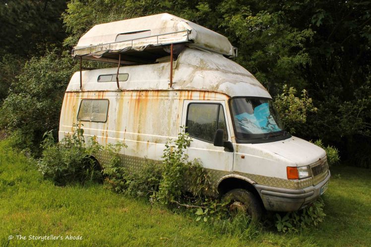 overgrown camper van